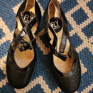 Fly London Black Patent Cross-Strap Flats